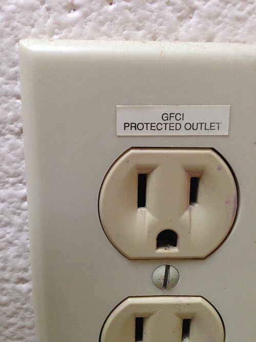 A 'GFCI protected' outlet. Every aquarium plug should be on a GFCI/RCD circuit.