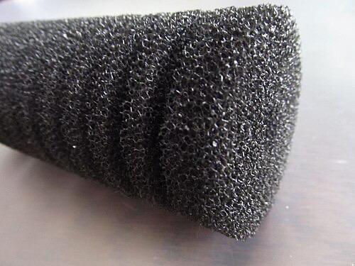 Filter sponge. When it's packed with brown gunk, squeeze it out in a bucket of tank water.