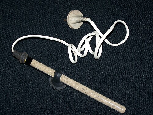 Heater with a temperature dial. A separate thermometer is how you catch one that's stuck on.