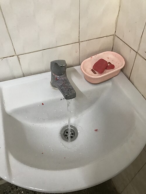 Soap on your hands is toxic to fish. Rinse very well with plain water before reaching into the tank.
